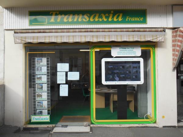 Logo de Transaxia Montlucon, professionnel de l’immobilier à Montluçon