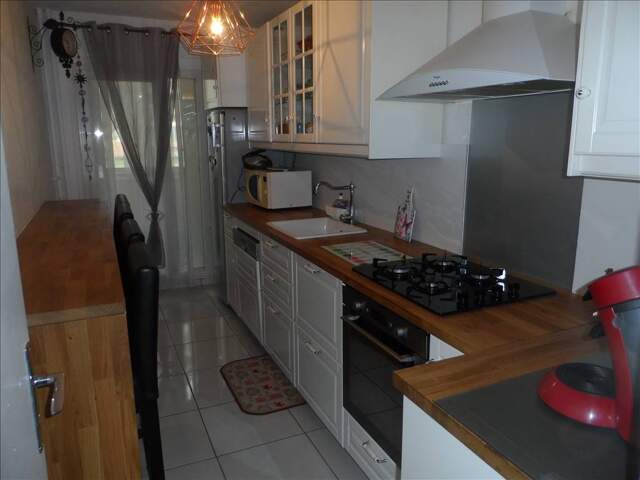 A VENDRE - Appartement — photo du bien