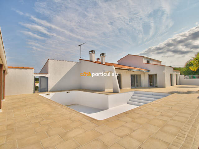 maison conviviale avec terrain constructible — photo du bien
