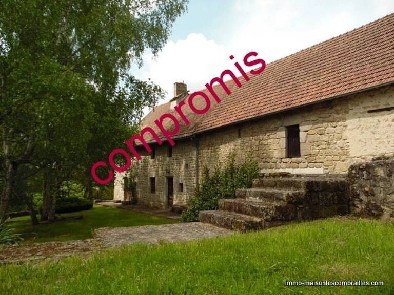A vendre près de Crocq, maison en pierre, garage et grange. — photo 1