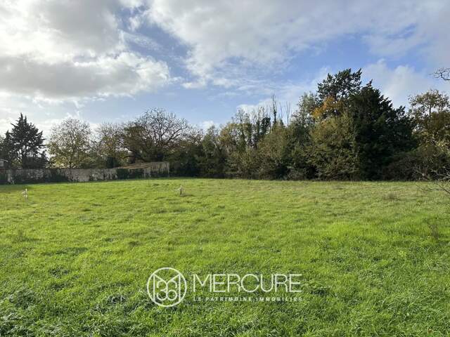 TERRAIN A BATIR 1.130 M² - CENTRE-BOURG — photo du bien