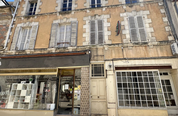 Immeuble de 3 appartements + 2 locaux commerciaux — photo 2