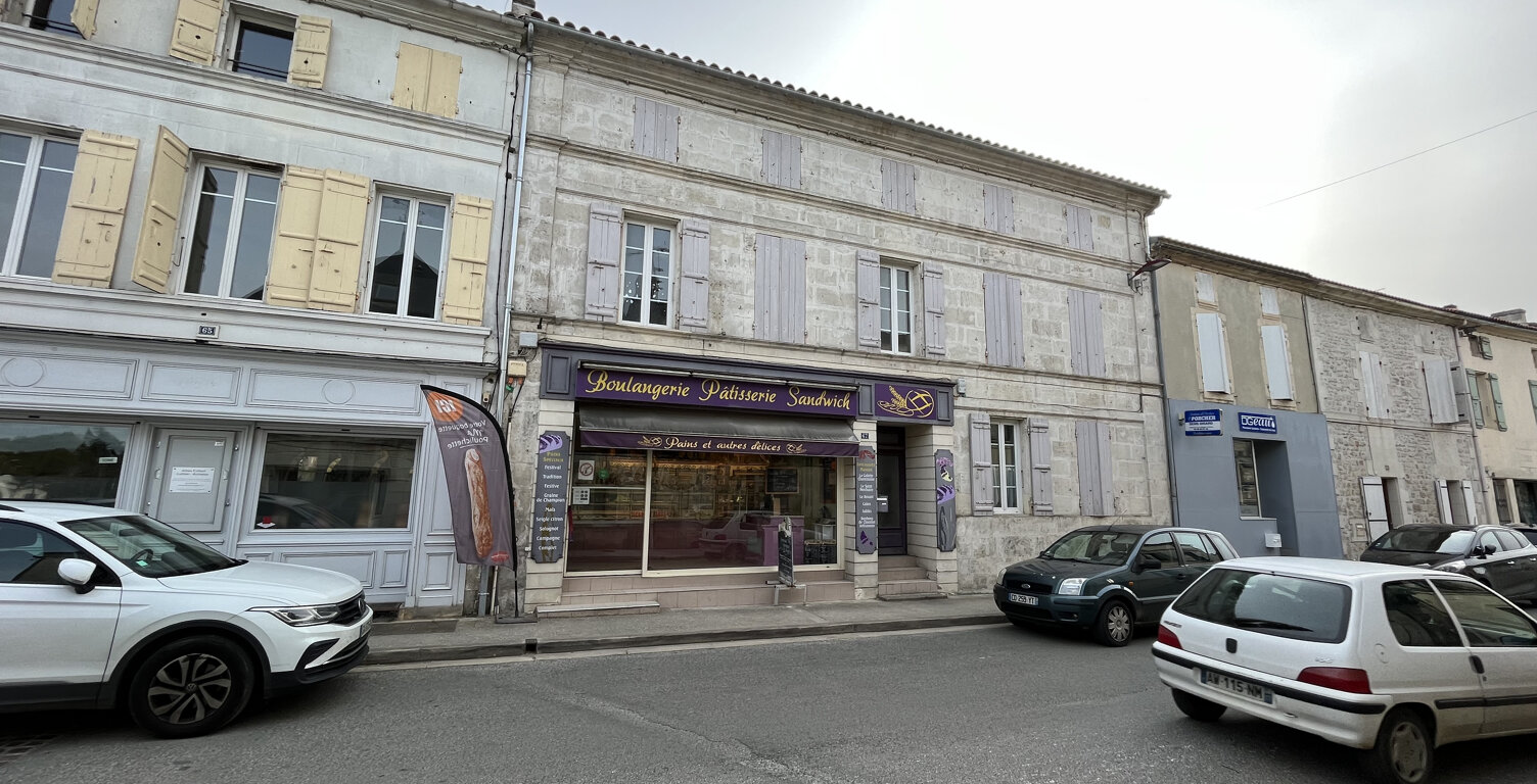 IMMEUBLE CENTRE VILLAGE — photo 1
