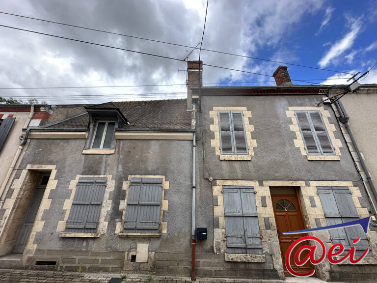 Immeuble de 2 appartements + un local commercial — photo 1