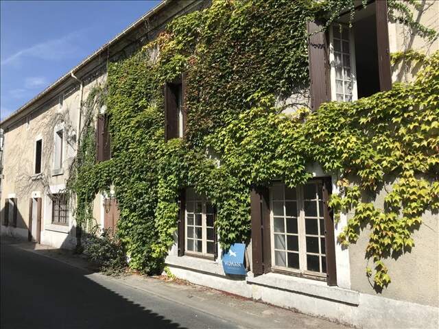 Maison de bourg de 7 pièces principales — photo du bien