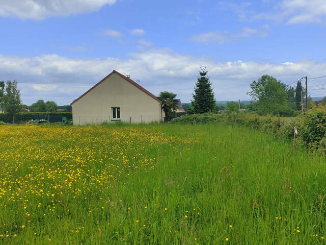TERRAIN A BATIR PLAT DE 1000 M2 AVEC TOUT A L' EGOUT DANS UN — photo du bien