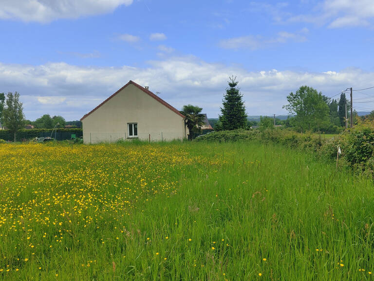 TERRAIN A BATIR PLAT DE 1000 M2 AVEC TOUT A L' EGOUT DANS UN — photo 1