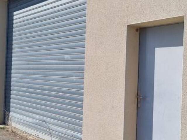 Entrepôt - 100m ² — photo du bien