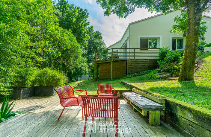 Maison et sa terrasse dans les arbres sur parcelle constructible — photo 2