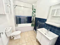 GRAND TYPE 1 AVEC PARKING - 31 M2 - PROCHE COMMERCES ET FAC — photo 4