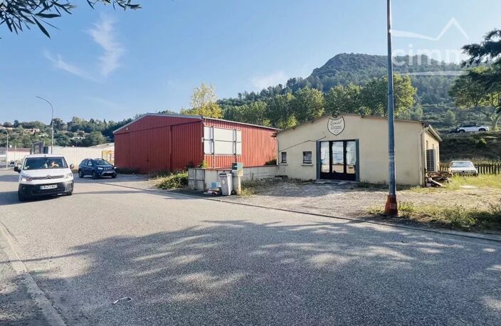 En zone commerciale local commercial avec logement et terrain — photo 2
