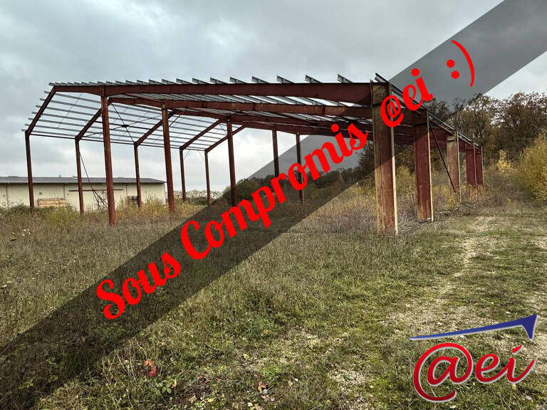 Terrain en ZA de 4500 m2 avec une charpente métallique de 980 m — photo 1