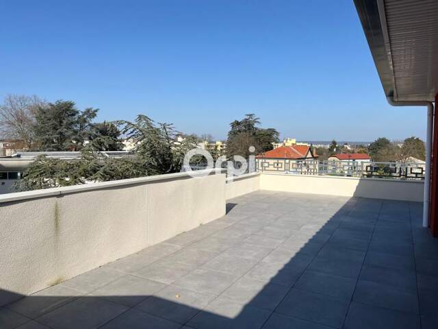 Appartement neuf en toit-terrasse Meyzieu. 5 pièces en attique de 118 m2 avec terrasse de 170 m2 — photo du bien