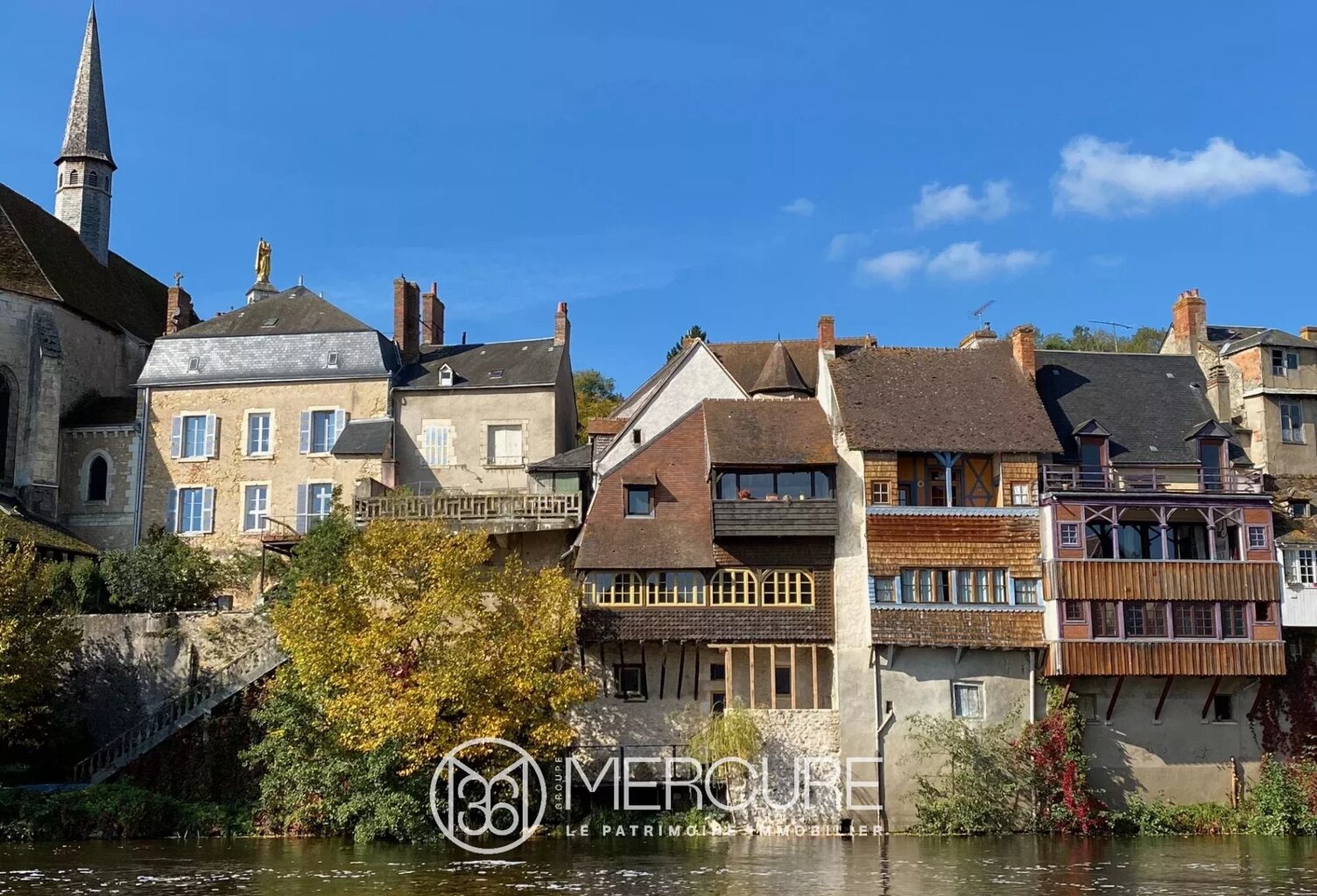 IMMEUBLE AVEC VUE SUR LA RIVIERE — photo 1