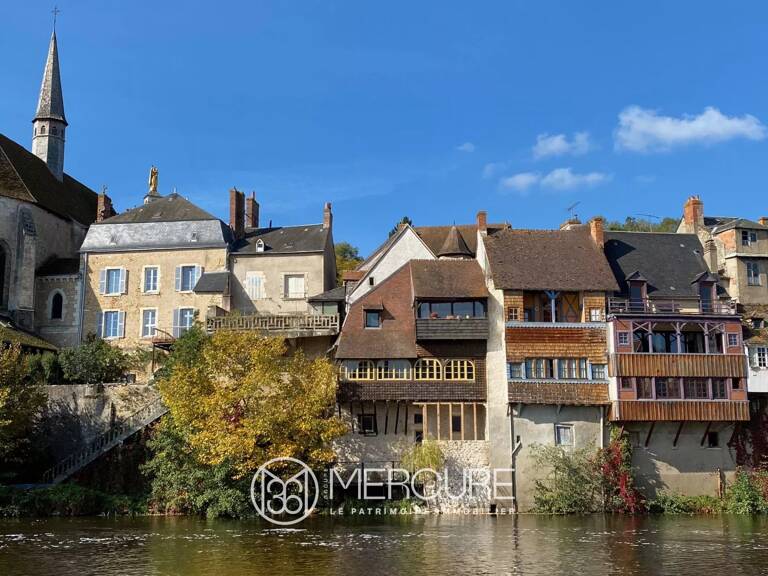 IMMEUBLE AVEC VUE SUR LA RIVIERE — photo 1
