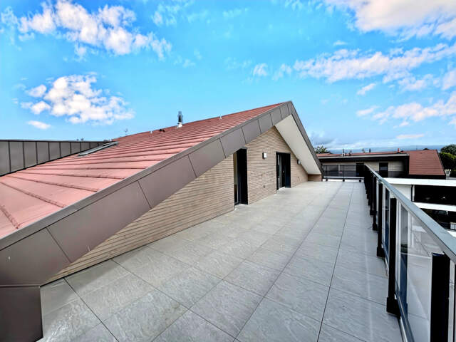 APPARTEMENT 4 PIECES AVEC UNE GRANDE TERRASSE A MESSERY - le — photo du bien