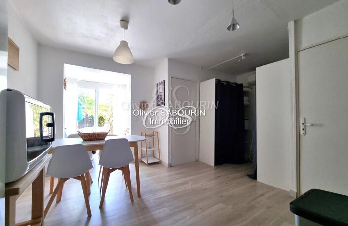 T2 REZ DE JARDIN + CAVE + GARAGE — photo 3