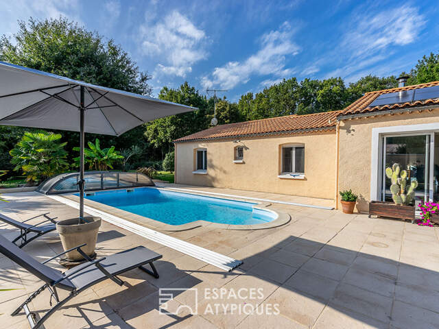Maison avec dépendances dans un écrin paisible de verdure — photo du bien
