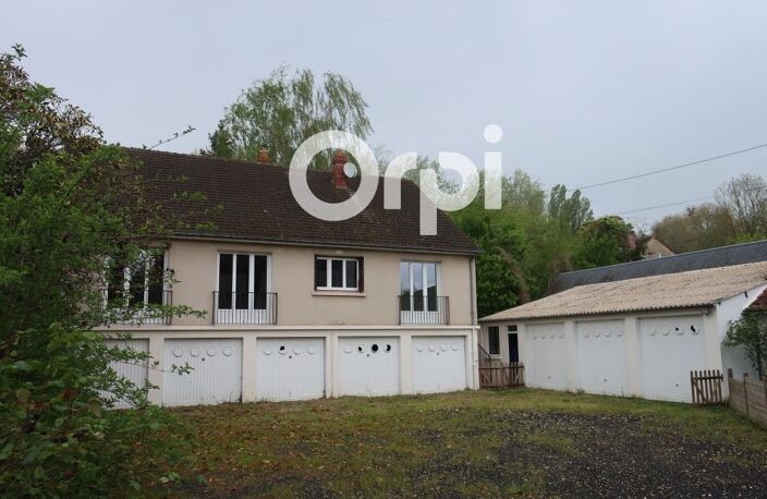Immeuble de rapport + maison + garages — photo 2