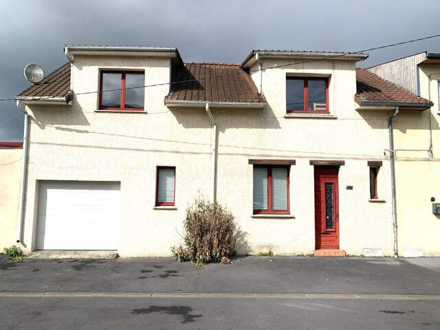 Maison mitoyenne avec garage située dans un secteur calme et — photo du bien