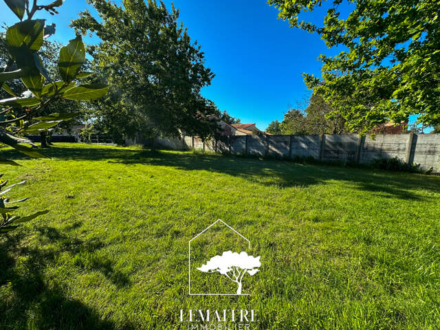 TERRAIN 1080M2 ENVIRON — photo du bien