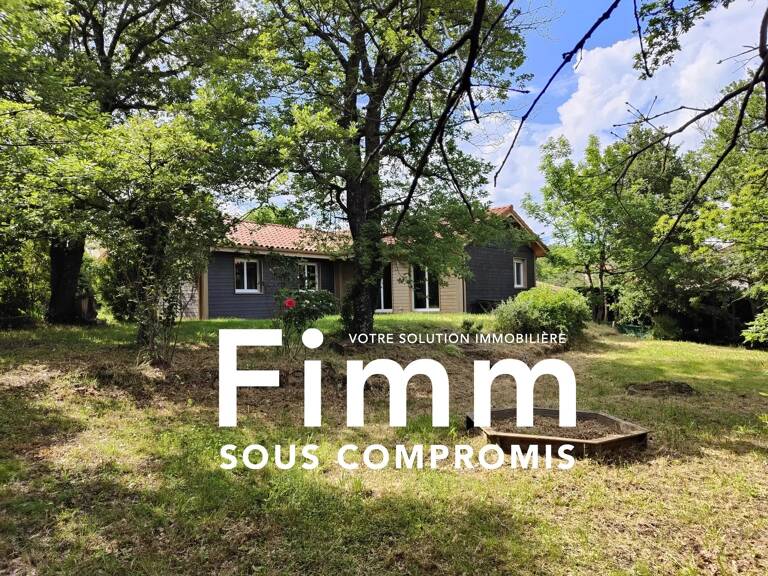 Maison plain-pied avec terrain arboré — photo 1