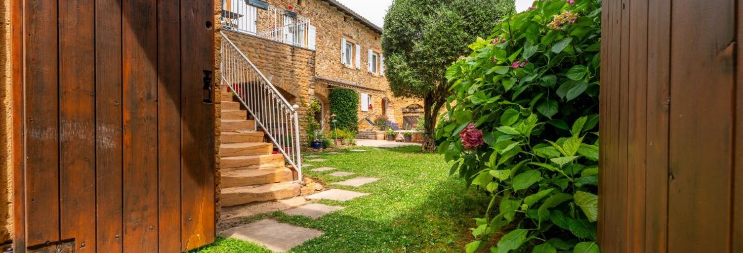 Maison 5 Pièces 212 m² à vendre à Porte des Pierres Dorées (69400)