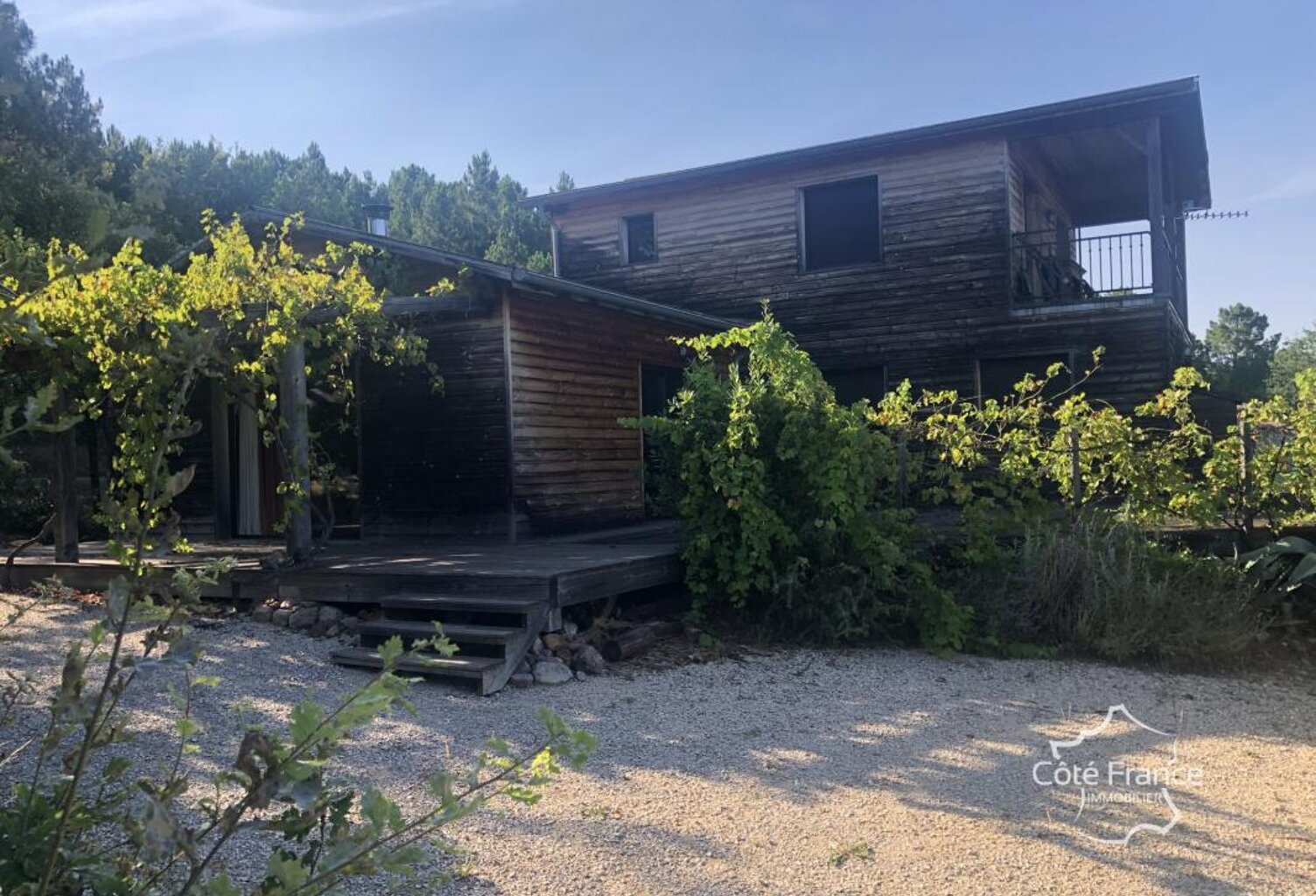 MAISON CONSTRUCTION EN BOIS SUR UN TERRAIN AVEC VUE DEGAGEE — photo 1