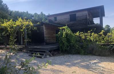 MAISON CONSTRUCTION EN BOIS SUR UN TERRAIN AVEC VUE DEGAGEE — photo du bien