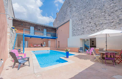 Proche de Castelmoron sur Lot, au coeur d'une bastide du XIII° siècle, superbe maison bourgeoise d'environ 329 m² avec cour intérieure et piscine.. Si vous êtes sensibles au charme des vieilles pierres, à la hauteur sous plafond, aux grands volumes, aux r — photo du bien