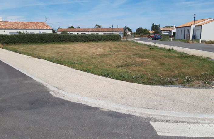 TERRAIN A PROXIMITE DES COMMERCES ET ECOLES — photo 3