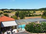 Exclusivité ! A vendre secteur de Castéra-Verduzan: Très belle maison en excellent état avec piscine couverte, appartement, 5 garages sur un magnifique terrain clos, fleuri et arboré de 2 616m2 — photo 2
