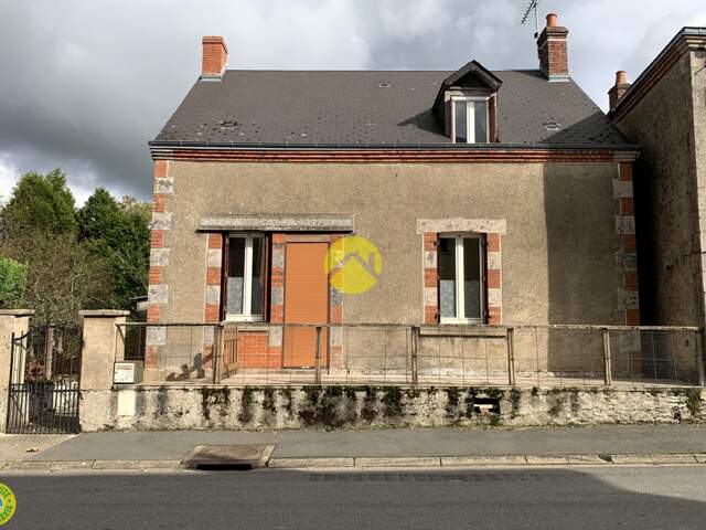 EN BOURG AVEC JARDIN — photo du bien