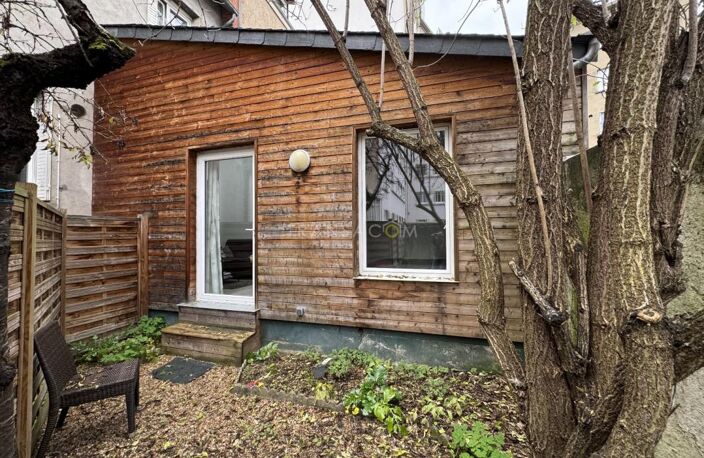 Appartement en rez-de-jardin — photo 5