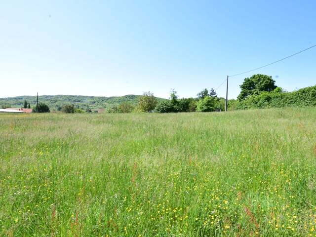 TERRAIN DE 2035 M² BIEN EXPOSE SECTEUR 'PROCHE AURIGNAC'... — photo du bien