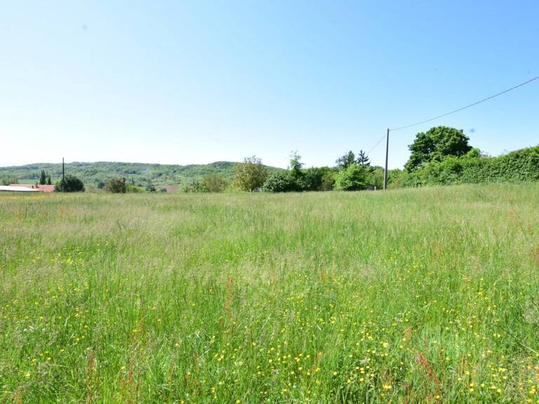 TERRAIN DE 2035 M² BIEN EXPOSE SECTEUR 'PROCHE AURIGNAC'... — photo 1