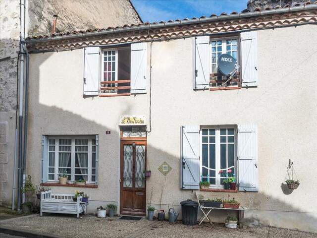 Maison de bourg de 5 pièces principales — photo du bien