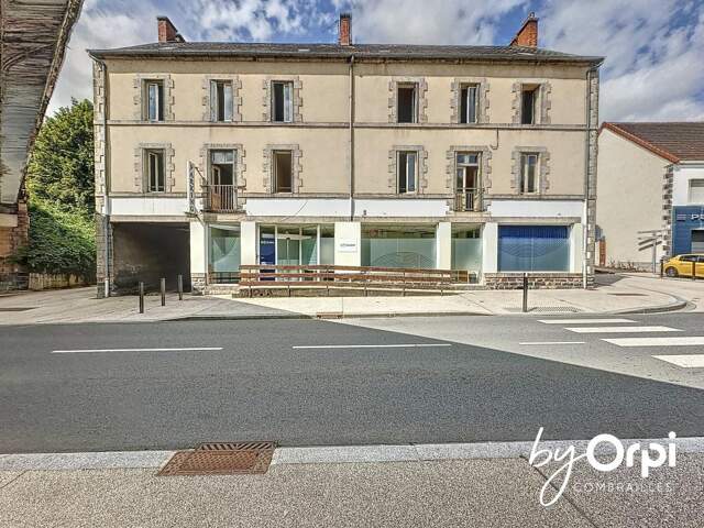 lot de 5 appartements avec grenier, caves, et stationnement — photo du bien