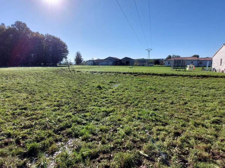 Terrain de 1 100m² proche de tous commerces SECTEUR 'PROCHE SALI — photo 1
