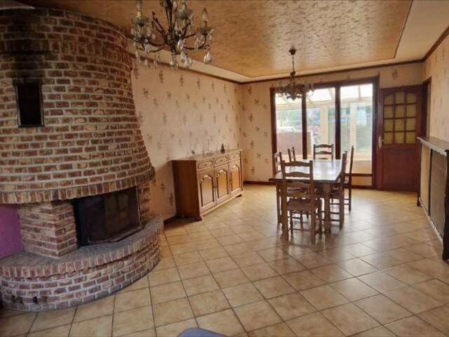 Maison, située sur le village de Sainghin en Weppes — photo du bien