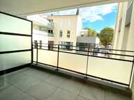 T2 avec balcon en plein centre de CHASSELAY — photo 3