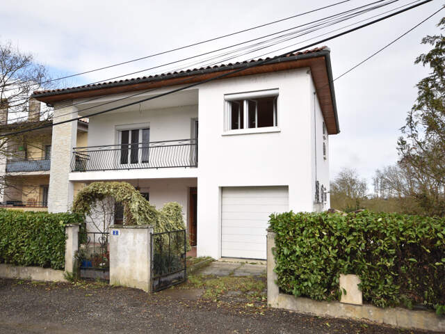 Maison 5 pièces 115 m2 proche du centre ville — photo du bien