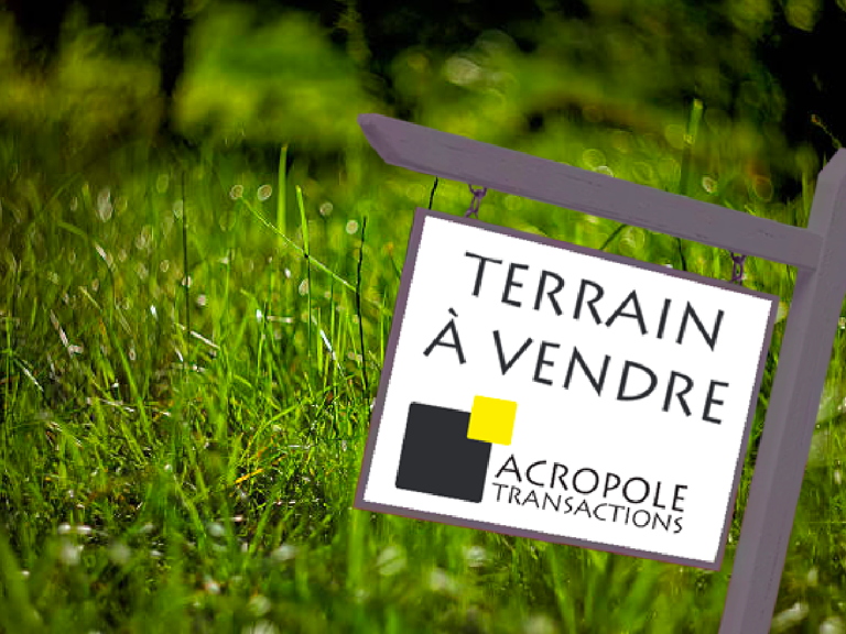 Terrain viabilisé au calme — photo 1