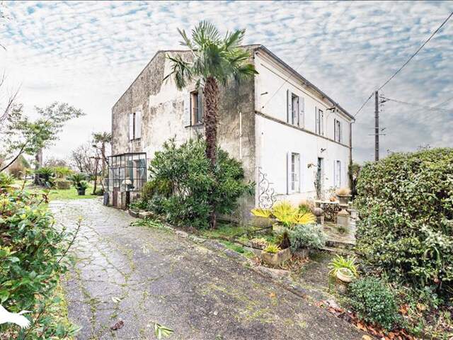 Maison en pierre de 6 pièces principales — photo du bien