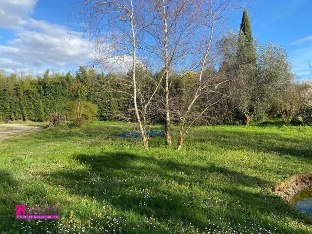 MAGNIFIQUE TERRAIN PLAT — photo du bien