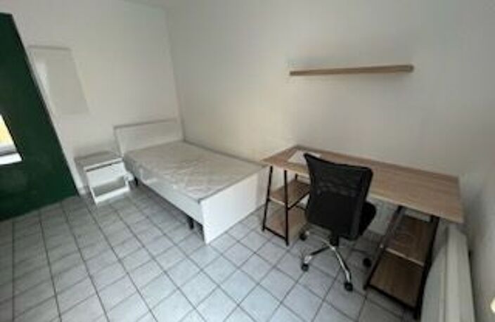 LOCATION d'un appartement T1 (18 m²) à NANCY - MEUBLE - 27 Rue Jean Lamour — photo 2