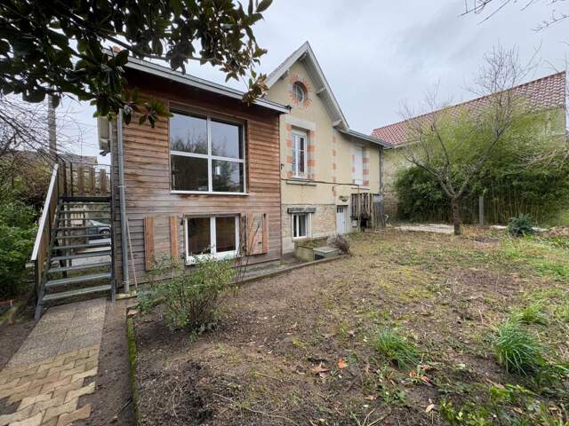 Maison de 1940 Saint Junien centre, 4 chambres, garage et jardin — photo du bien