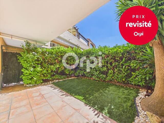 REZ DE JARDIN - LUMINEUX - STATIONNEMENT - CAVE - PROCHE DE TOUTES LES COMMODITÉS — photo du bien