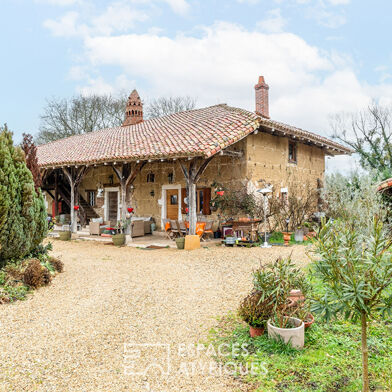 Maison 10 pièces 599000 €