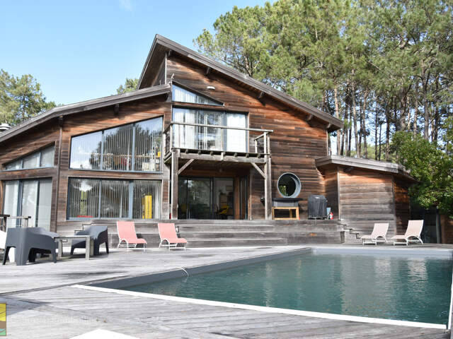 Maison en ossature bois   232 m2   Piscine   Quartier recher — photo du bien